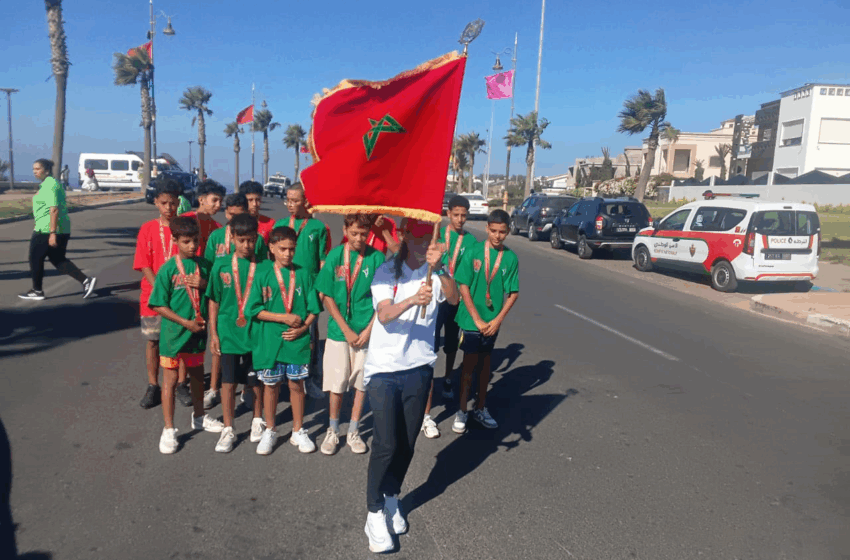 اسفي: البطلة فاطمة الزهراء الكردادي تحمل العلم الوطني في المرحلة السادسة من “سباق التناوب الرمزي المسيرة الخضراء”